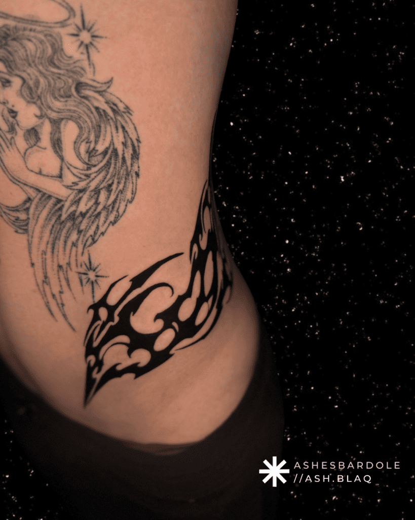 Fantasy blackwork tattoo with bold linework and high contrast, created by Ashes Bardole, a blackwork tattoo artist specializing in custom designs.