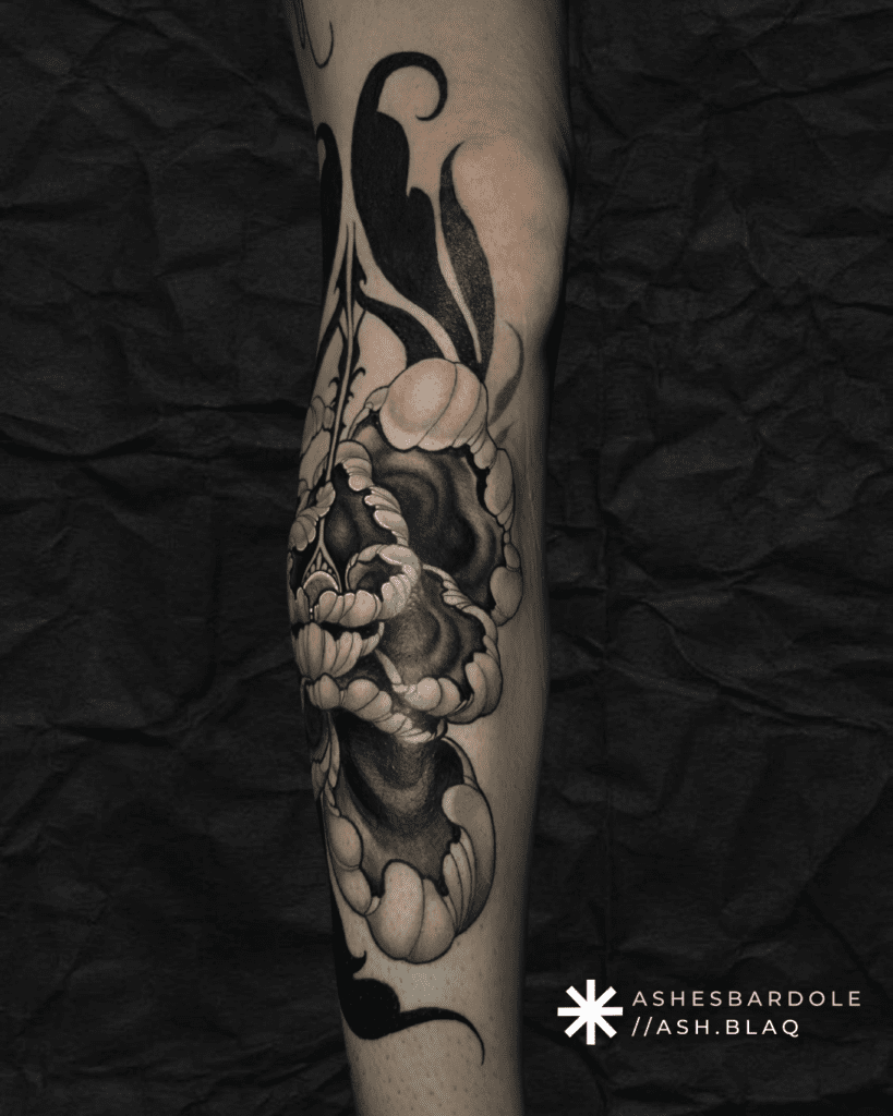 Fantasy blackwork tattoo with bold linework and high contrast, created by Ashes Bardole, a blackwork tattoo artist specializing in custom designs.