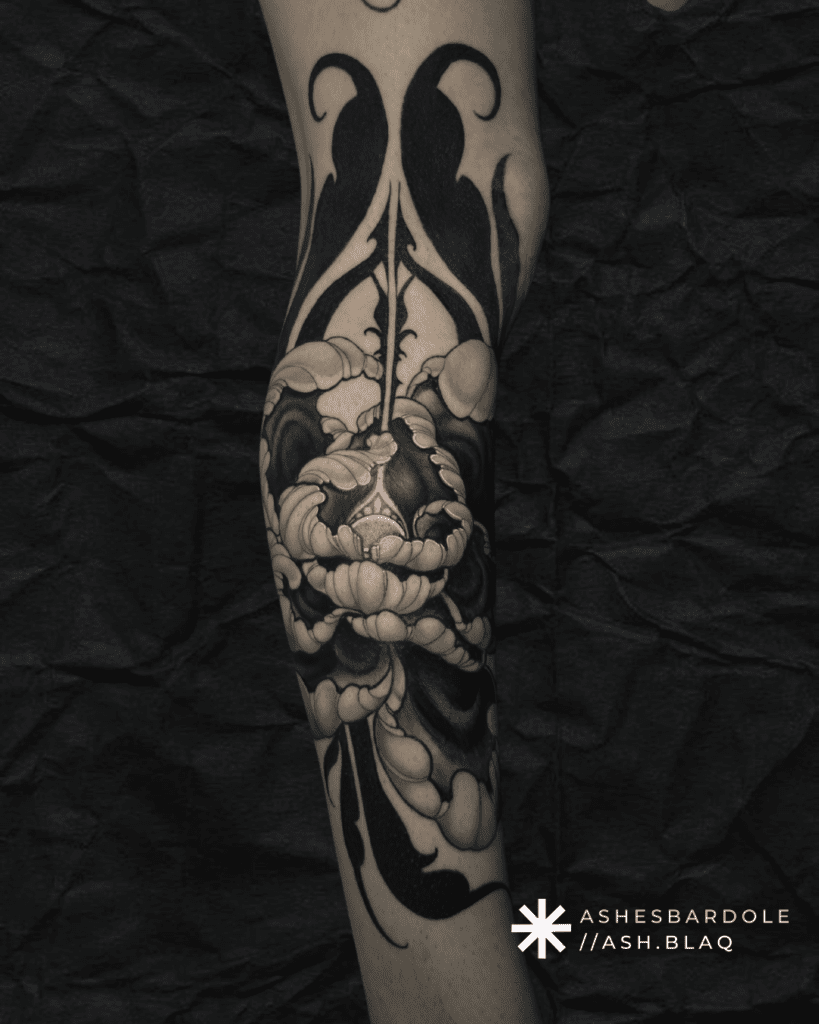 Fantasy blackwork tattoo with bold linework and high contrast, created by Ashes Bardole, a blackwork tattoo artist specializing in custom designs.